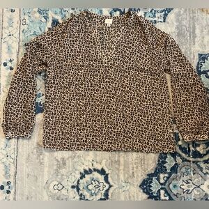 a new day semi-sheer leopard print blouse. Size XL